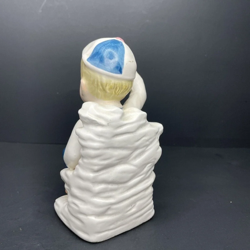 Vintage Boy Wearing Cap Saluting & Sitting Cross‎ Legged Bud Vase White & Blue
